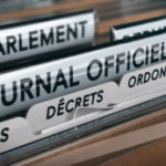 Vote des lois au parlement et publication au journal officiel